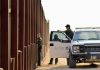 Trump’s Deportation Team DIVIDED – What’s Happening? Border patrol agents near a tall metal fence.