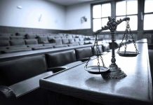 Judge Issues Astonishing Ruling in Kirk Case – Courtroom Stunned Scales of justice in an empty courtroom.