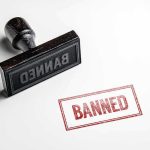 Banned stamp and rubber stamp on white background.