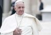 AI Hoax: Vatican Battles Digital Deception Pope Francis smiling while wearing white robes in an outdoor setting