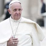 AI Hoax: Vatican Battles Digital Deception Pope Francis smiling while wearing white robes in an outdoor setting