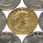 Trump $1 Coin Plan IGNITES Washington Brawl A collection of coins featuring a gold coin surrounded by silver coins