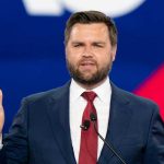 Vance Announces PREGNANCY – Breaks 248-Year Record! Man in a suit speaking at an event.