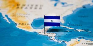 Map of Central America with a flag of El Salvador pinned on it