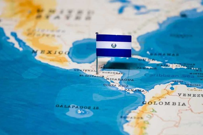 Map of Central America with a flag of El Salvador pinned on it