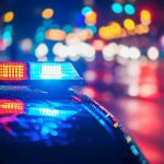 Twisted Couple MURDER Child – Their ‘Reason’ Why Stuns! Police car with flashing lights at night.