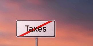 Sign with the word Taxes crossed out.