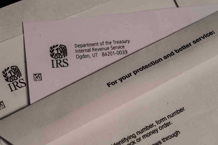 IRS letters and envelopes on a table.