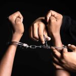 Knife Wielding Lunatic Released — Fear Returns to the Streets Handling handcuffs and unlocking with a key.