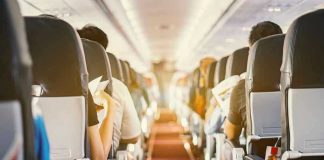 Midair Mayhem Sparks Emergency Dive Passengers seated inside an airplane cabin.