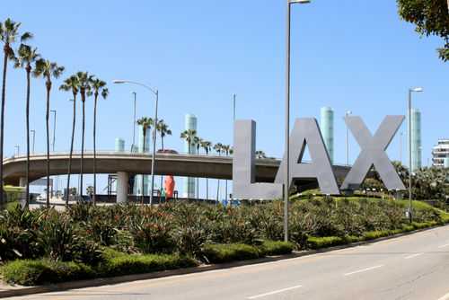 lax1958136745jpg-1 LAX sign with palm trees and blue sky