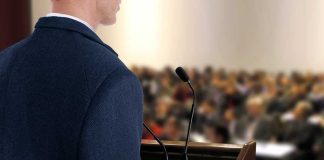 Religion Fuels Political Divide in U.S. A speaker at a podium addressing an audience