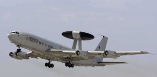 Lithuania Weighs Hosting US Nuclear Weapons NATO AWACS aircraft taking off from an airfield
