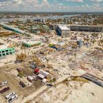 Triggers Criminal: Roof Collapse Claims 14 Children Aerial view of hurricane-damaged buildings and debris.