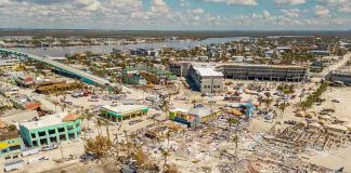 Triggers Criminal: Roof Collapse Claims 14 Children Aerial view of hurricane-damaged buildings and debris.