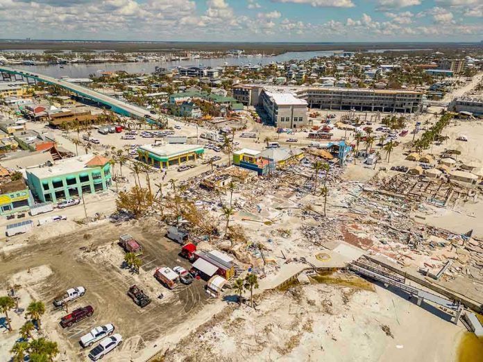 2208987255 Aerial view of hurricane-damaged buildings and debris.