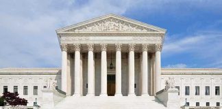 6–3 Shock: Liberals Didn’t Do It Front view of the Supreme Court building with large columns and steps under a blue sky