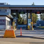 Trade War Reignites as Trump Slaps 50% Tariffs on Canada Canada border crossing booths with open and closed lane signs