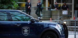 Seattle Food Festival Shooting Leaves 3 Dead Seattle Police SUV parked on a city street