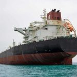 Washington Faces a New Maritime Crisis With Iran Large oil tanker anchored in calm sea
