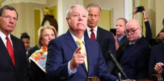 Medical Facts: Official Findings Confirm Natural Cause A group of government officials at a press conference with one speaking into a microphone