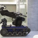 Orbital Repair Robot Brings New Focus A robotic arm mounted on a tracked base in a modern workspace