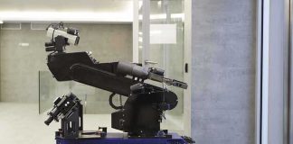 Orbital Repair Robot Brings New Focus A robotic arm mounted on a tracked base in a modern workspace