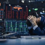 Oracle Crash Wipes Out $100B on Paper Trader stressed out by multiple declining stock charts.