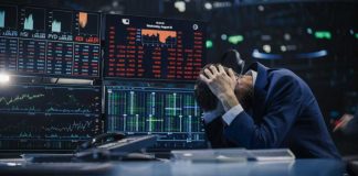 Oracle Crash Wipes Out $100B on Paper Trader stressed out by multiple declining stock charts.