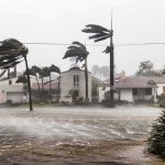 The Lunch Break That Saved a Classroom and Students Houses battered by hurricane winds and flooding