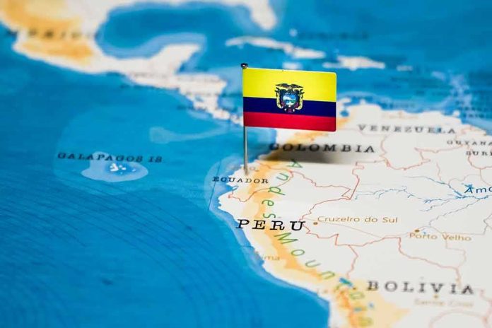 shutterstock_1326827759 Ecuador flag pin on a map of South America