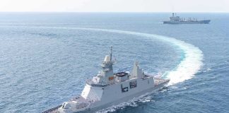 Russian Naval Activity Near Britain Surges naval warship making a sharp turn at sea