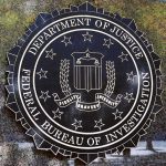 FBI seal on a building wall