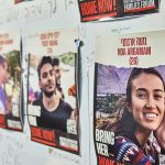 Posters of missing people on a wall