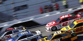 Taxpayer Tab Hides Behind IndyCar Hype Stock cars racing side by side on a banked track