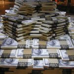 $3 Million Hidden Across 19 Accounts Stacks of U.S. hundred-dollar bills arranged in a pyramid