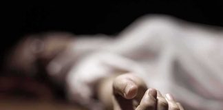 18-Year-Old Dies After Fraternity Event hand of a person lying on the floor