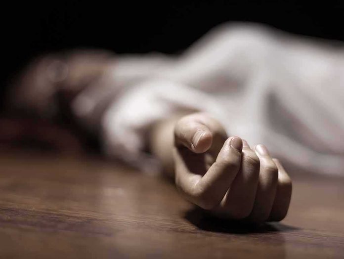 shutterstock_107145812 hand of a person lying on the floor