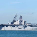 U.S. Military Action Sparks Calls for Transparency Aircraft carrier sailing on calm blue water