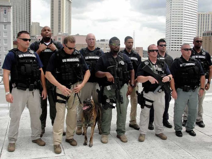 Group of law enforcement officers with tactical gear and a K9