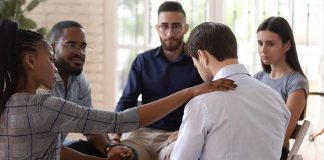 Ancient Bible Story Meets Modern Identity Debate support group comforting a man