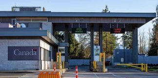 U.S.-Canada Trade War Escalates Canada border crossing booths with open and closed lane signs
