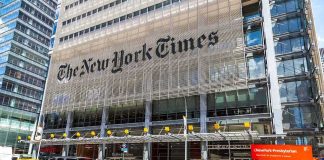 Judge Blocks NYC Rideshare Deactivation Law New York Times building with yellow taxis in front