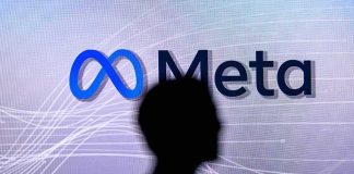 Privacy Nightmare: Meta’s AI glasses Exposed! silhouette in front of Meta logo on screen