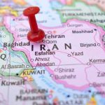 Red pushpin on a map of Iran