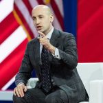 Supreme Showdown: Miller Demands End to Birthright Citizenship Stephen Miller speaking on stage during a panel discussion