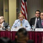 Jim Jordan speaks at a committee hearing with Jerrold Nadler and Darrell Issa seated beside him