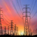 Nationwide Blackout Cripples Cuba Power transmission towers and lines at sunset