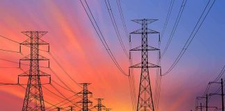 Nationwide Blackout Cripples Cuba Power transmission towers and lines at sunset