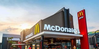 2,500-Mile Journey Ends in Theft McDonald's restaurant exterior with drive-thru at sunset